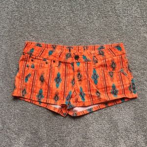 Orange aztec print shorts from RUE21